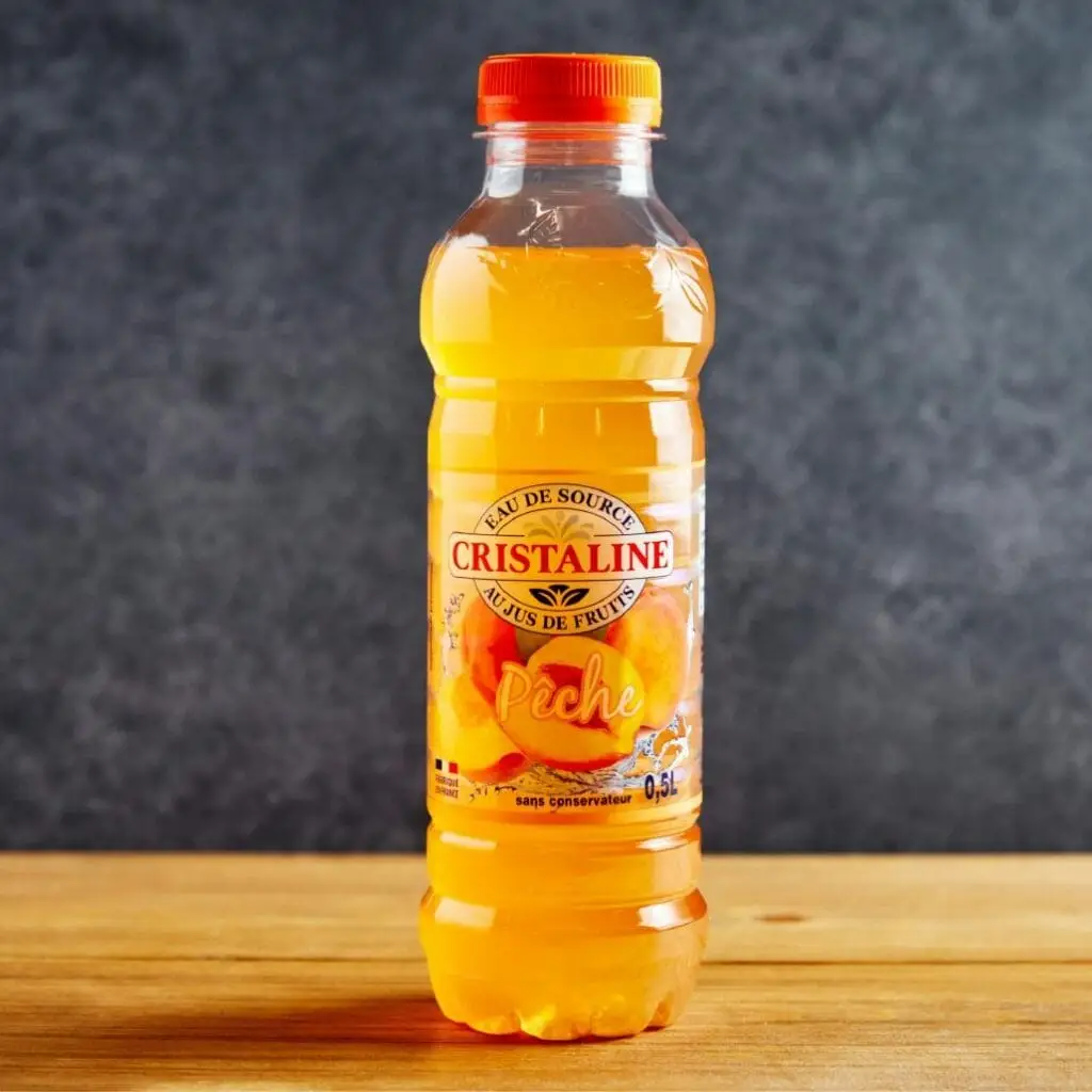 Bangcook – Cristalline Pêche, une boisson fruitée et rafraîchissante au bon goût de pêche, idéale avec vos plats thaï.